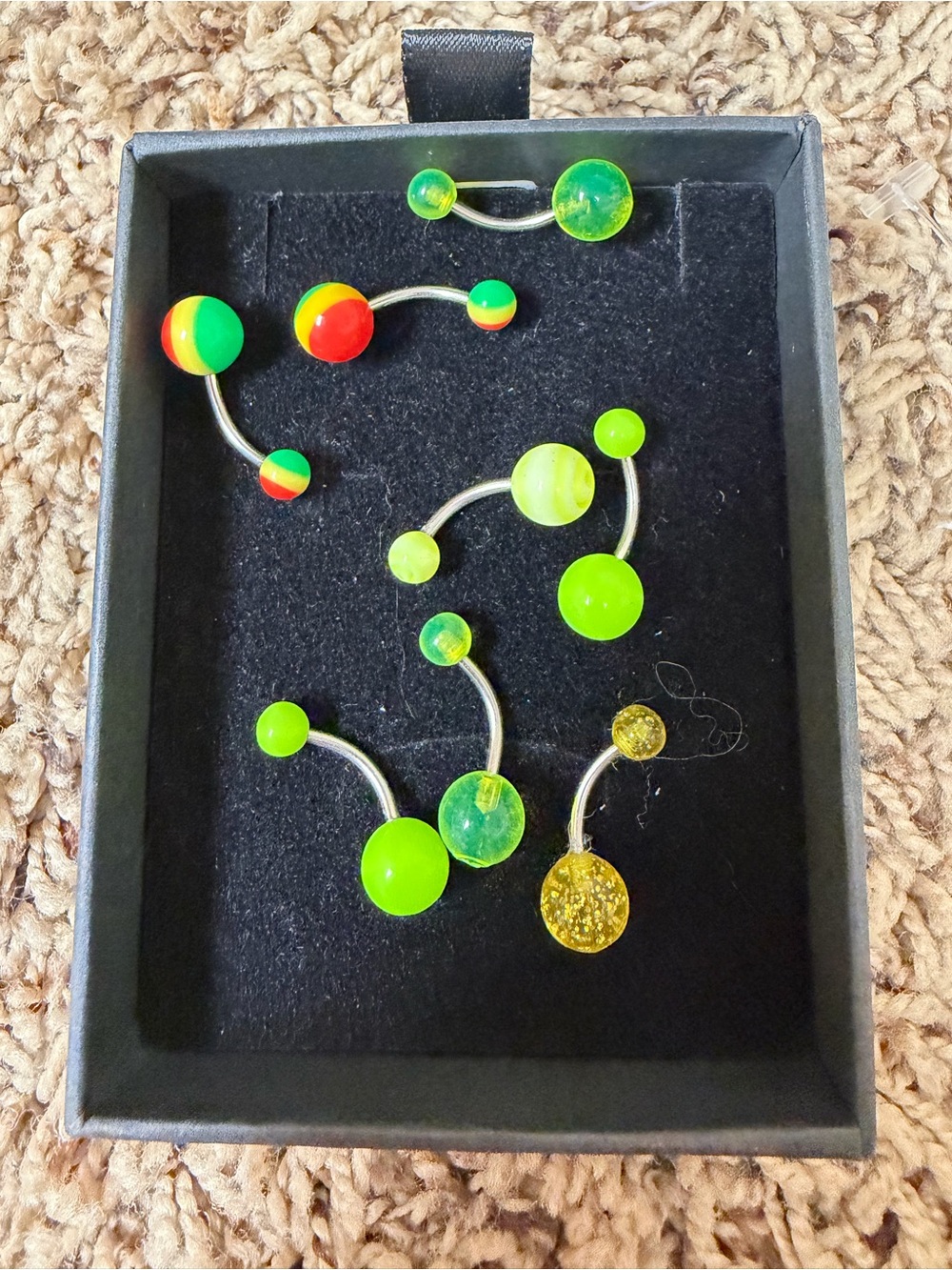 Neon belly button rings